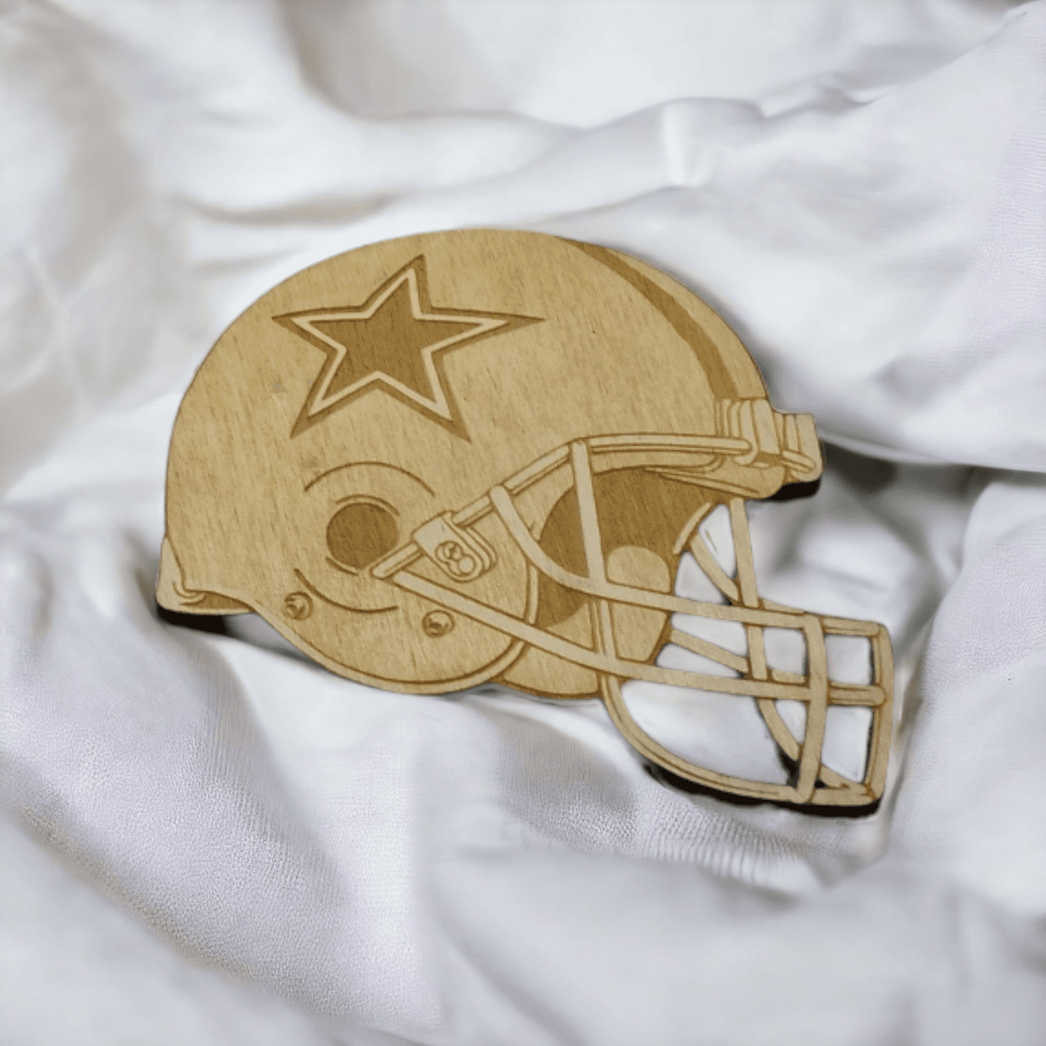 Handmade wooden coaster featuring the Dallas Cowboys helmet logo.