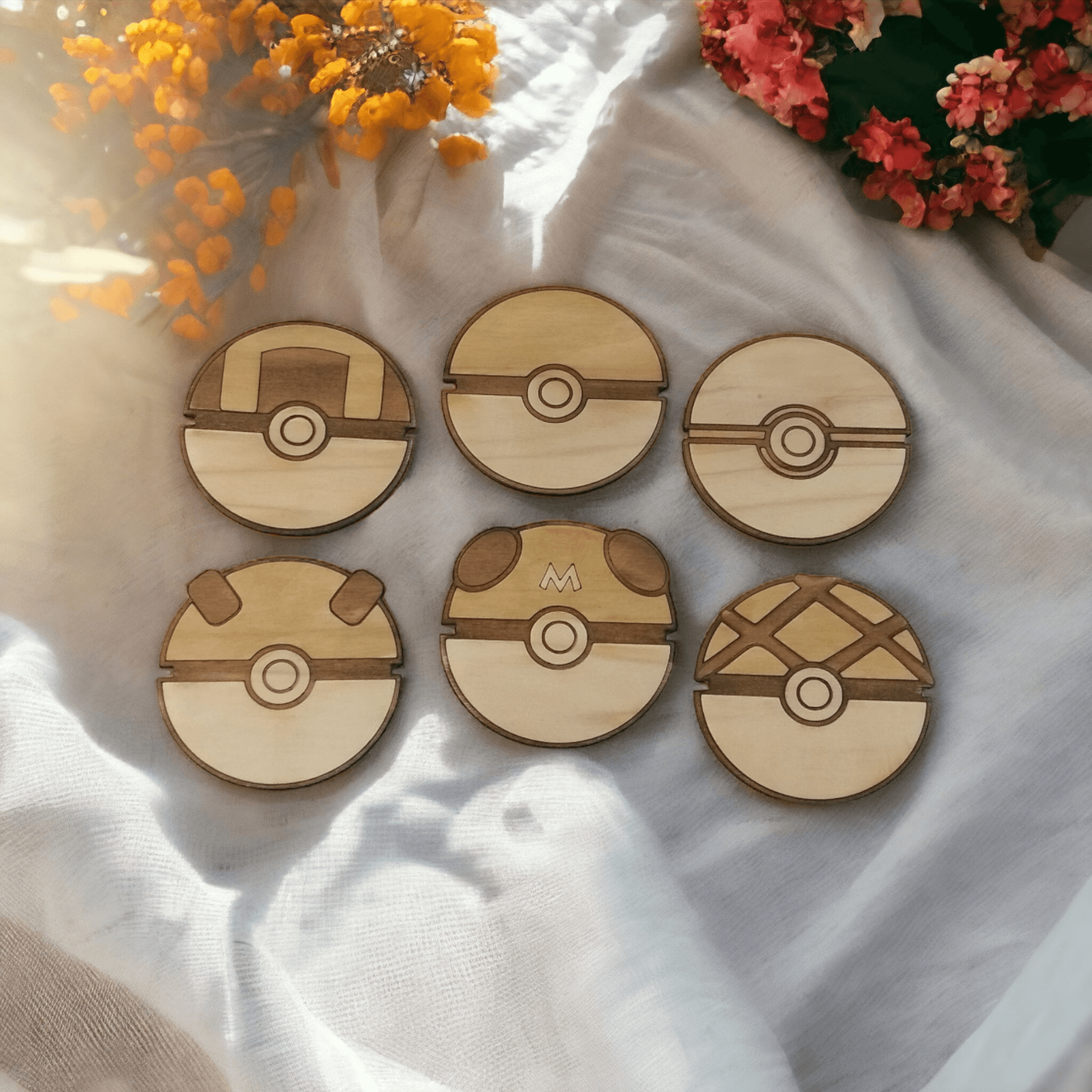 Set of 6 handmade Pokeball wooden coasters arranged in a stack