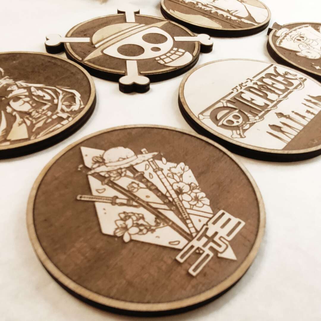 Handmade Wooden Coasters featuring One Piece characters Luffy and Zoro by DECANTRE