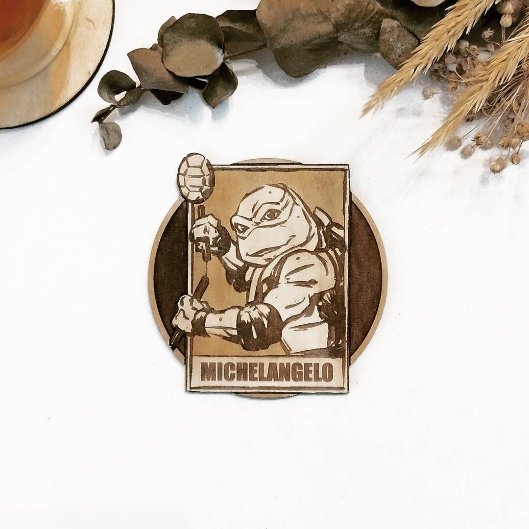 Handcrafted eco-friendly wooden coaster with Michelangelo design from TMNT